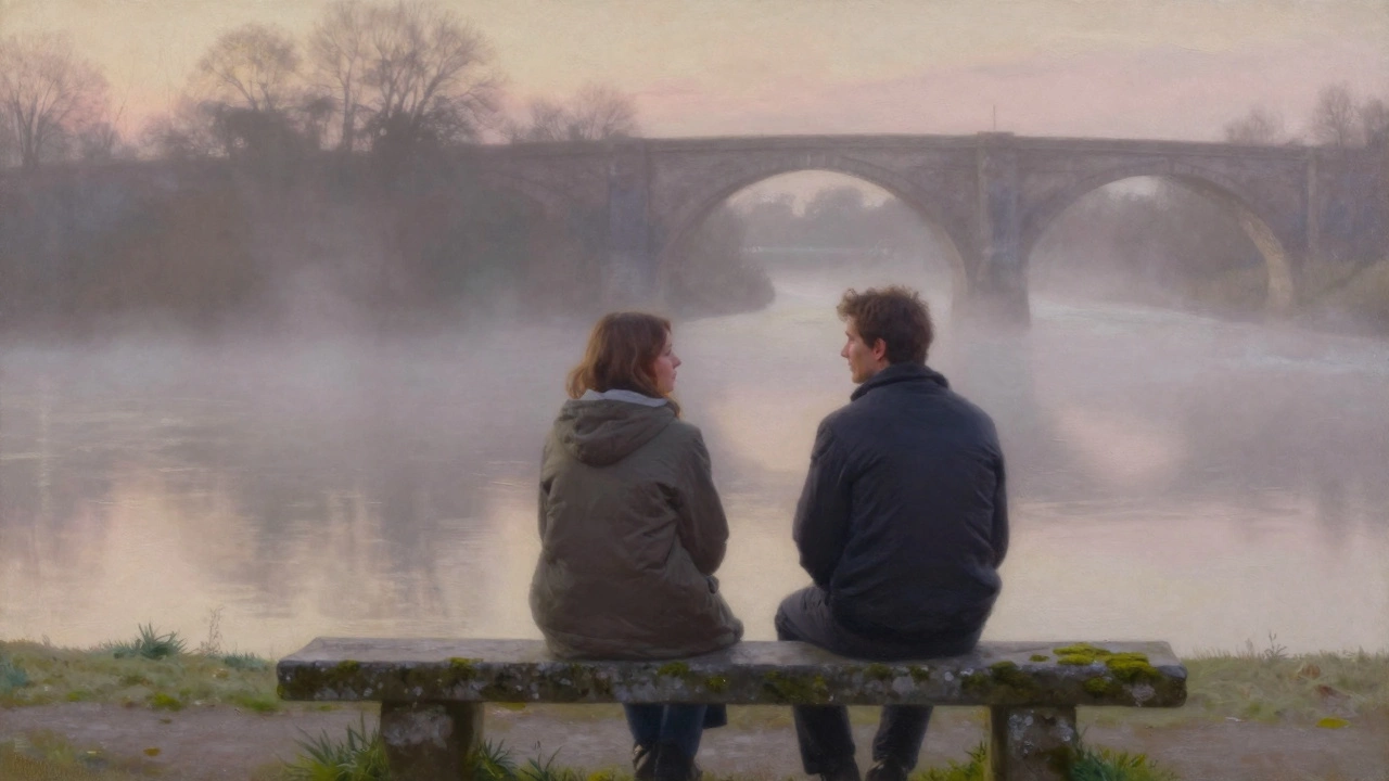 Two people sit peacefully on a riverside bench at dawn, sharing quiet company under a medieval arch.